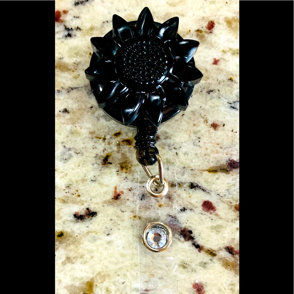 Black sunflower badge reel. Nurse badge reel. Teacher badge reel. Dentist reel.